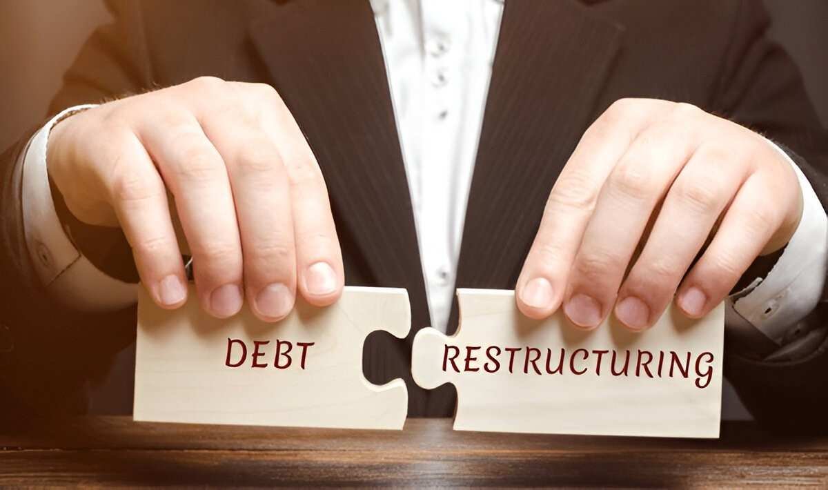Understanding Debt Restructuring Definition, Examples, and Benefits